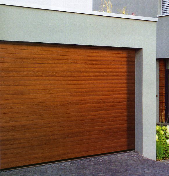 Picture of a Hormann Rollmatic insulated roller garage door in Golden Oak